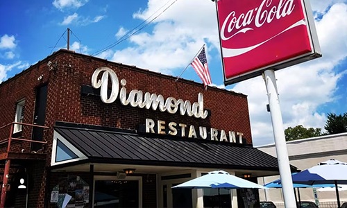 store with a large red sign